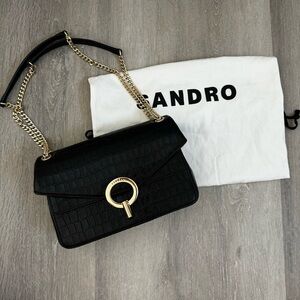 Sandro black crocodile embossed leather handbag.